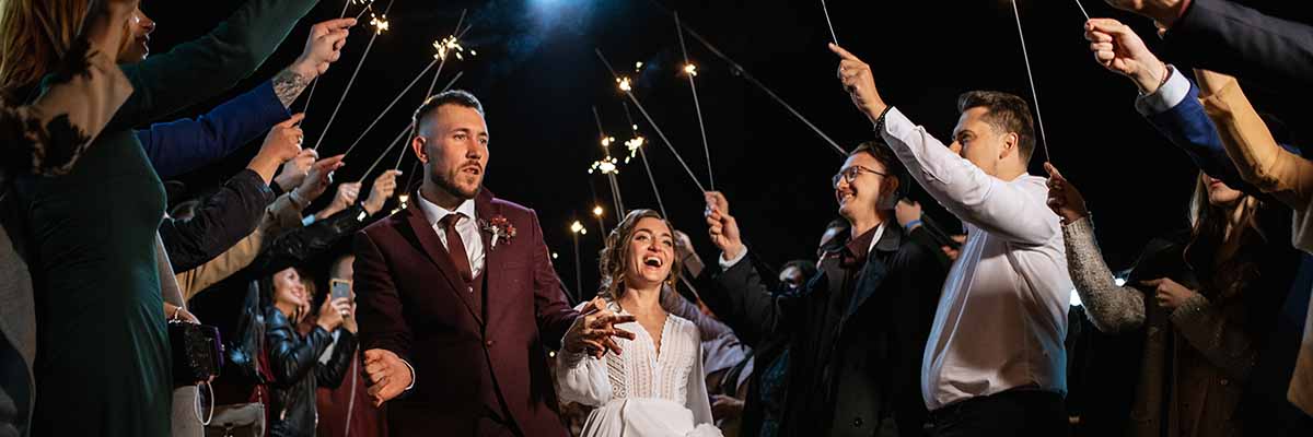 newlyweds-at-a-wedding-of-sparklers