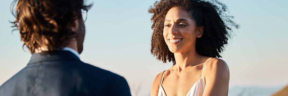 wedding-smile-and-couple-holding-hands-at-beach